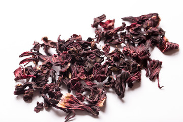 Hibiscus tea on a white isolated background close-up.