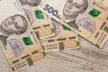500 Ukrainian money on desk. Save money