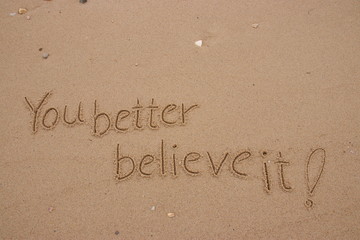 Fototapeta premium inscription on the sand, Handwriting words 