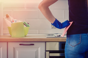 woman cleans in the kitchen. concept of cleanliness and order.