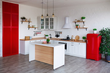 Modern Kitchen Interior with Island, Sink, Cabinets, and Big Window in New Luxury Home.