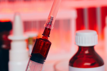 Syringe with blood inside close up photo