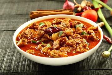 Bowl of spicy meat curry in gravy