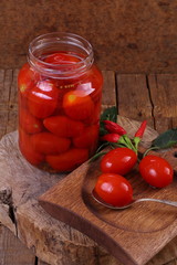 Still life with tomato juice on a wooden table