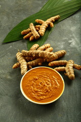 Indian cooking  ingredient- organic turmeric cream, paste, with fresh roots
