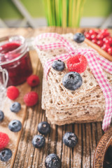 Blueberries and raspberry on pastry toast decorated at christmas image