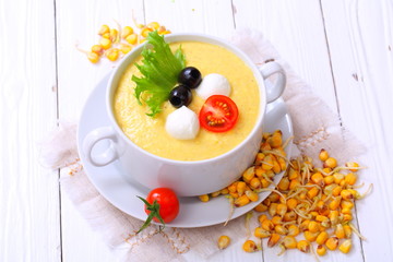 Corn porridge on wooden background