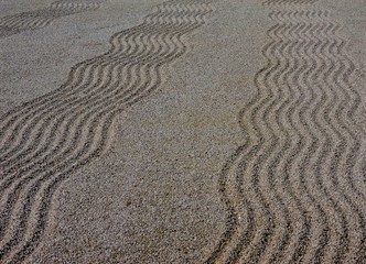 Fototapeta na wymiar Zen lines in the sand
