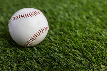 Baseball ball on the grass