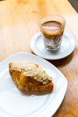 Glass of Nitro Cold Brew Coffee on wood  Table in Coffee Shop, Fresh Drink Compost