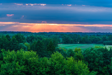 The Beautiful sunset over the countryside in summer