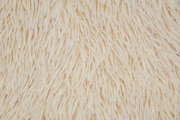 Fluffy plaid of polyester with a long heap peach. Comfortable home textiles.