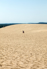 People on the Dune of Pilat, the tallest sand dune in Europe. La Teste-de-Buch, Arcachon Bay, Aquitaine, France