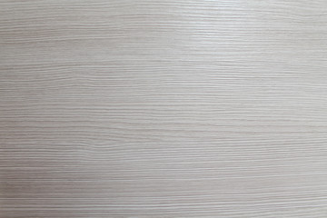 Fototapeta premium Beige abstract wooden texture background. Copy space for text. Top view of artificial backdrop
