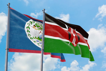 Kenya and Belize flags waving in the wind against white cloudy blue sky together. Diplomacy concept, international relations.