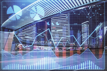Forex chart on cityscape with tall buildings background multi exposure. Financial research concept.