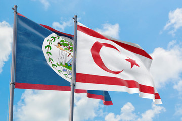 Northern Cyprus and Belize flags waving in the wind against white cloudy blue sky together. Diplomacy concept, international relations.