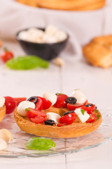 Friselle with tomatoes and mozzarella cheese.