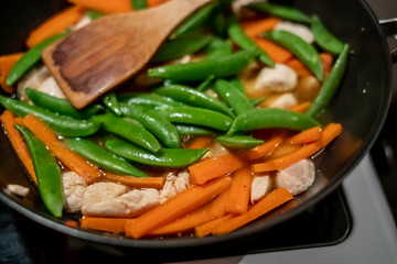 Selective focus on healthy vegetables being stir fried