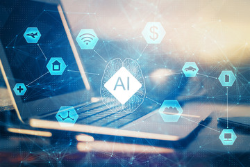 Double exposure of desktop computer and technology theme hologram. Concept of software development.