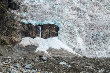 Closeup view to a small waterfall on Adishi glacier in Svaneti mountains of Georgia