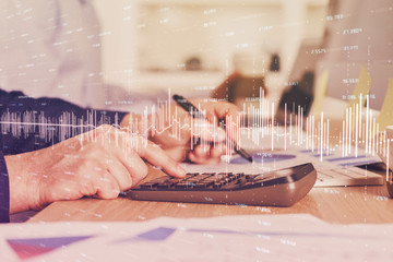 Financial trading graph multi exposure with man desktop background.