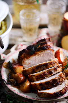 Roasted pork loin with apples.style rustic