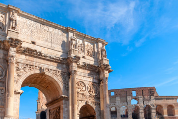 Arch of Constantine and Colosseum in Rome, Italy. Triumphal arch in Rome, Italy. North side, from the Colosseum. - 320496004