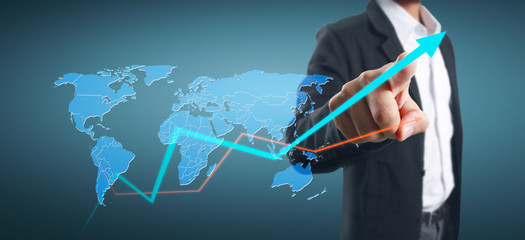 Hand touching a graphs of financial indicator accounting market economy analysis chart