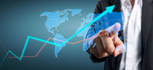 Hand touching a graphs of financial indicator accounting market economy analysis chart