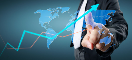 Hand touching a graphs of financial indicator accounting market economy analysis chart