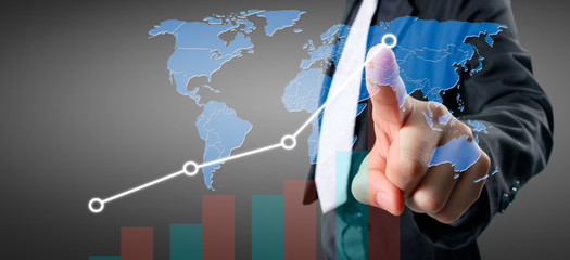 Hand touching a graphs of financial indicator accounting market economy analysis chart