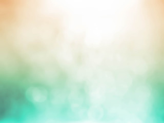 Abstract bokeh flare sunlight with blur green and yellow nature sunrise beach background.
