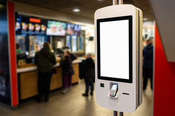 Self-service desk with touch screen in fast food restaurant - obrazy, fototapety, plakaty