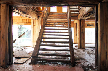 Fototapeta na wymiar Wooden staircase, abandoned house, demolished house