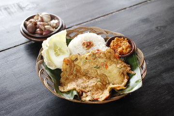 fried egg with rice and spicy sauce