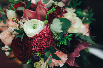 Wedding bouquet of white and red roses