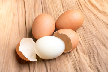Eggshell and chicken eggs on the ground, brown banana leaves in the studio.Boiled eggs are a food for everyone's health.