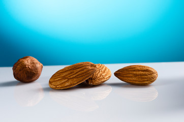 Almond nuts on a beautiful blue