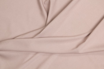 Obraz premium Fabric jeans fold top view. Pink textile
