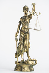 Fototapeta premium Statue of justice. Law and justice concept. White background with copy space.