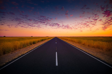 Naklejka premium Australian Highway in Sunset