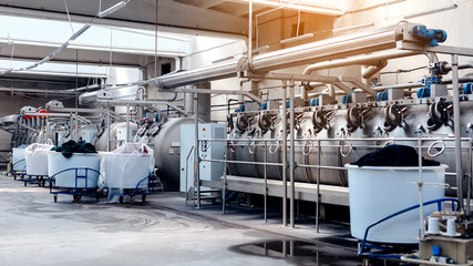 Textile Manufacturing. Circular knitted fabric. Textile factory in spinning production line and a...