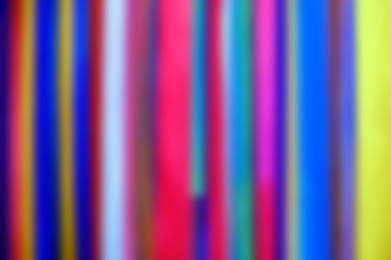 Blurred background of colorful ribbons, close-up