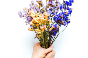 Man hand holding beautiful flowers in white background for special event