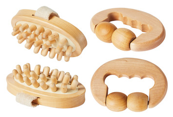 Wooden massager with rolls and  handheld scrubbing wooden massager isolated on white background Anti cellulite therapy, deep tissue massage and spa treatment concept