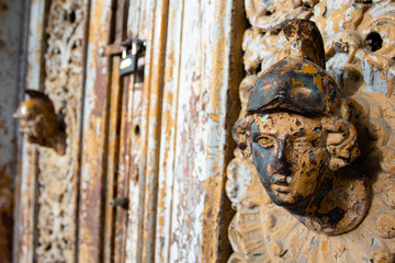 Metal door leaf with figures of persons in the palace in the Szczepanow (Szczepanów) village, Sredzki (Średzki) poviat, Lower Silesia, Poland