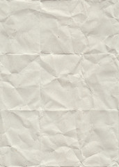 Folded and crumpled recycled paper. Seamless pattern with a folded and crumpled recycled paper texture.