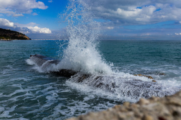 waves crashing on rocks