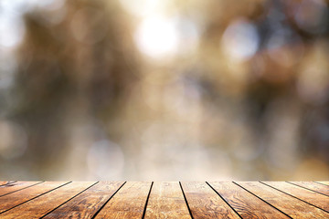 Beautiful sunlight in the woods with a wooden plank floor